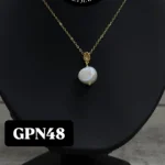 Gargantilla con dije de perla cultivada...