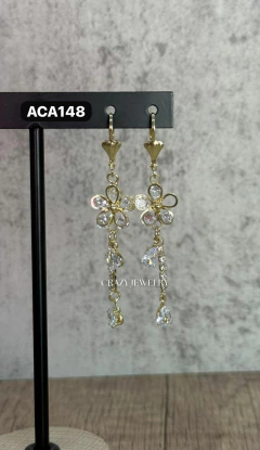 Aretes largos con flor y gotas- acero in...