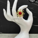 Anillo acero dorado ajustable - Sol rojo