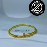 Brazalete dorado de acero inoxidable - C...