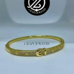 Brazalete dorado de acero inoxidable - C...