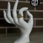 Anillo ajustable acero - catarina dorada...